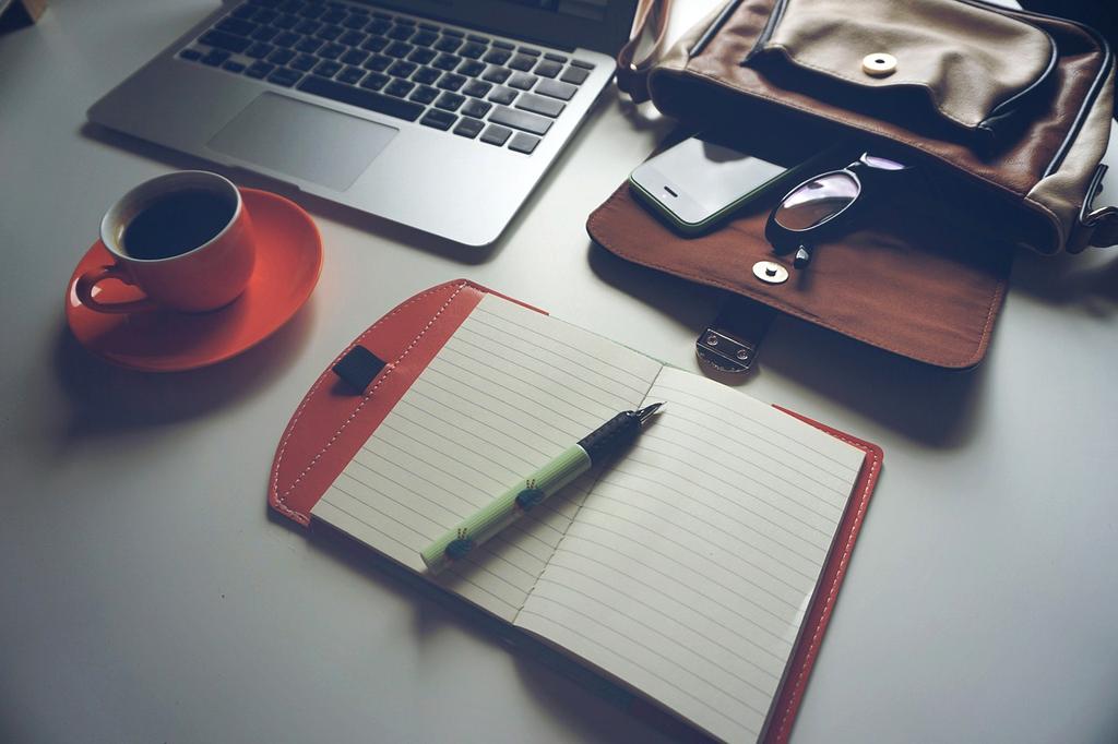 Person organizing digital files on multiple devices