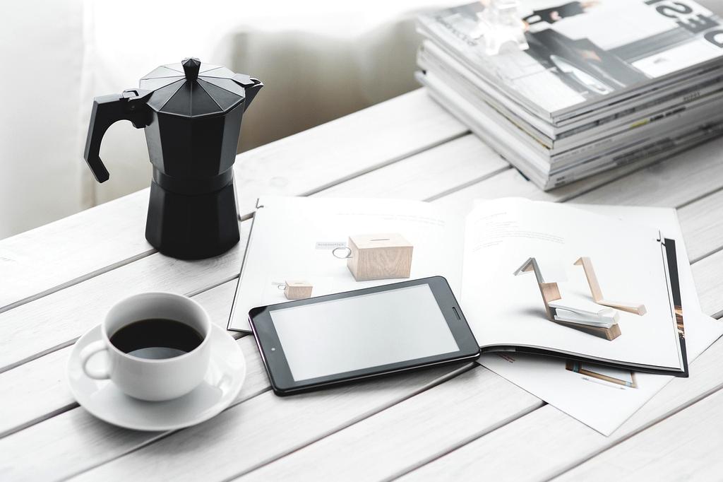 Modern digital workspace with organized devices and clean desktop setup